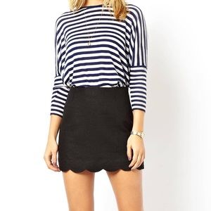 Linen mini skirt with scallop hem